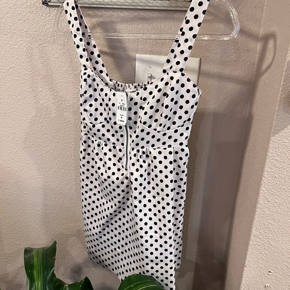 𝅺WHAT Comes Up Black & White Polka Dot Shirt - Picture 1 of 7
